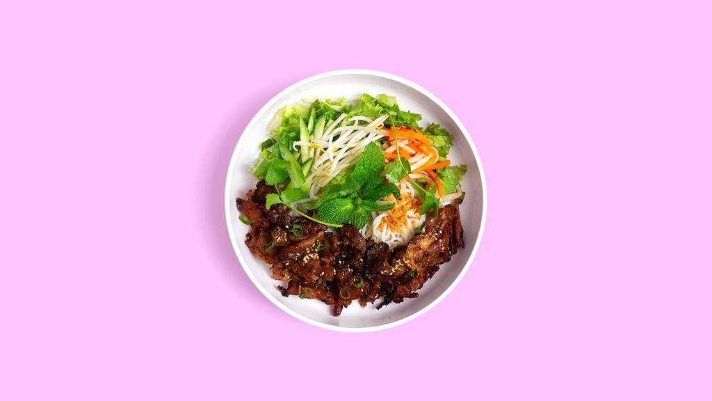 Pork Vermicelli Bowl · Marinated pork with lettuce, cucumber, and basil topped with crushed peanut, green onion, pickled carrot.