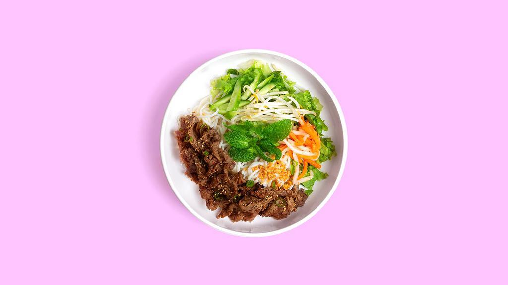 Steak Vermicelli Bowl · Grilled steak with lettuce, cucumber, and basil topped with crushed peanut, green onion, pickled carrot.