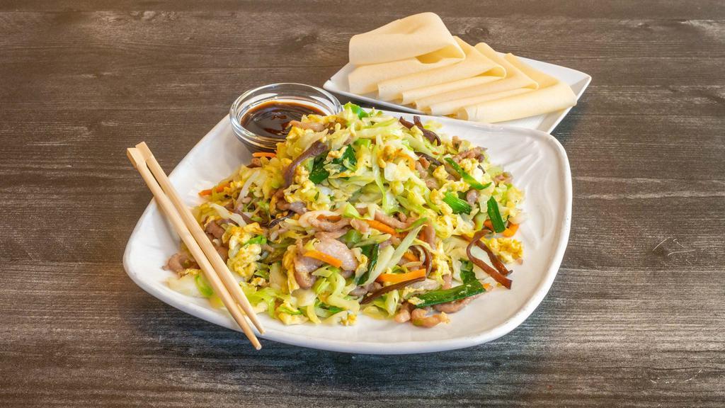 Mu-Shu · Choice of pork, beef, chicken or vegetables. Stir fried with scrambled eggs, green onions, onions, carrots, cabbage and bamboo shoots, served with four pancakes.