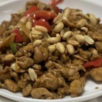 Kung Pao Chicken · Spicy. Stir fried with green and red peppers, peanuts & water chestnuts, in mighty spicy, sw...