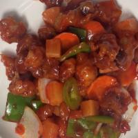 Sweet & Sour Pork · Deep fried pork cubes in a tangy sweet & sour sauce.