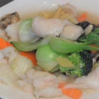 Jade Fish Fillets or prawns · Stir fried with vegetables in white garlic sauce.