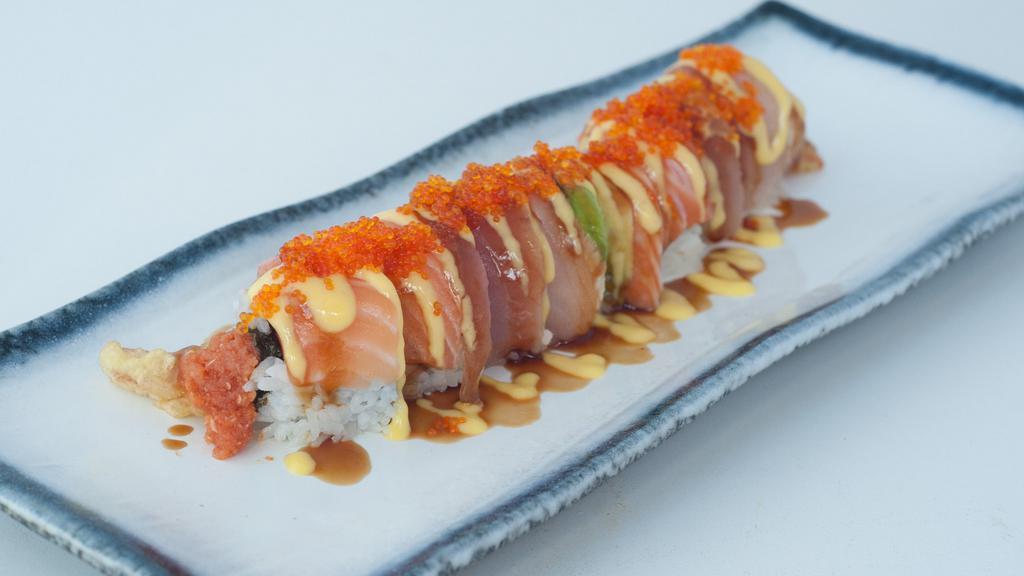 Hanabi · Spicy level one. In: shrimp tempura, spicy tuna, cucumber. Out: salmon, white tuna, avocado, tobiko, green onion, unagi sauce, mango sauce.