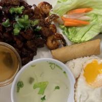 Cm11. Bbq Pork, Eggroll, and Prawn Over Fried Egg · Com Tom, Thit Nuong, Cha Gio, Trung Opla