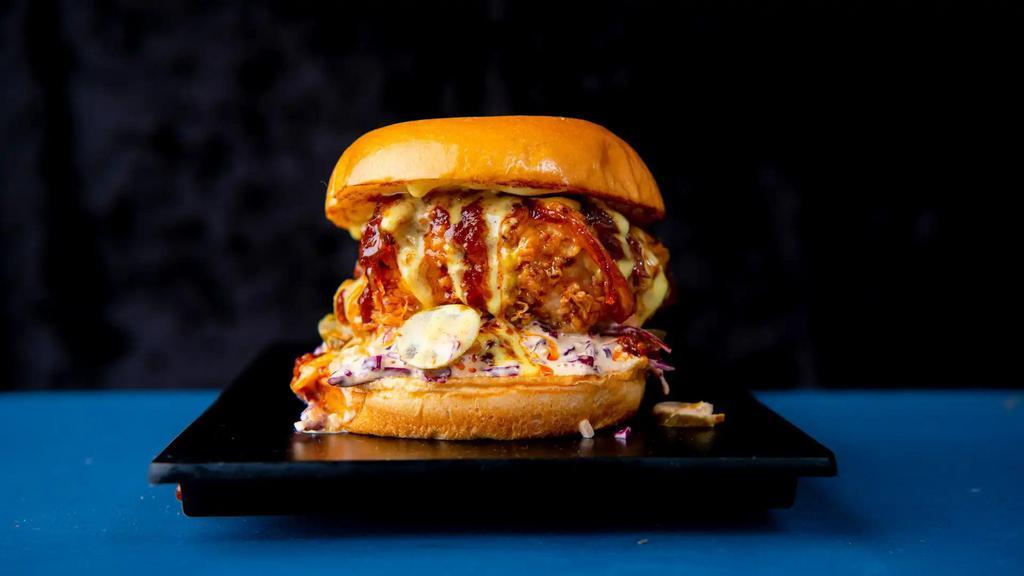 Hot Mess( Medium Spicy) · Popular Item. Crispy fried chicken dipped in inferno sauce, desi slaw, pickles, curry mayo.