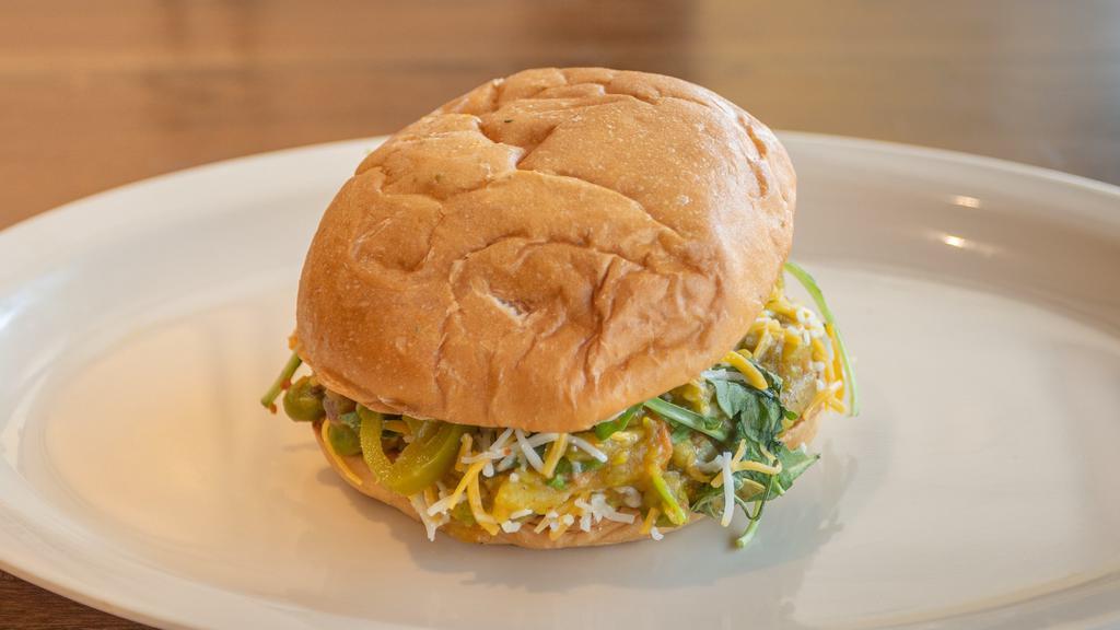 Beyond Burger · 100% plant-based beyond burger patty, curry mayo, desi slaw, pickles, cheese.