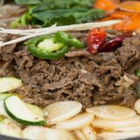 Bul Go Ki Stew · Beef stew with Vegetables, Glass noodles and rice cakes.
Large Soup