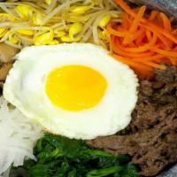 Bi Bim Bop Rice Bowl with Vegetables. · Served with Spicy Sauce on the side