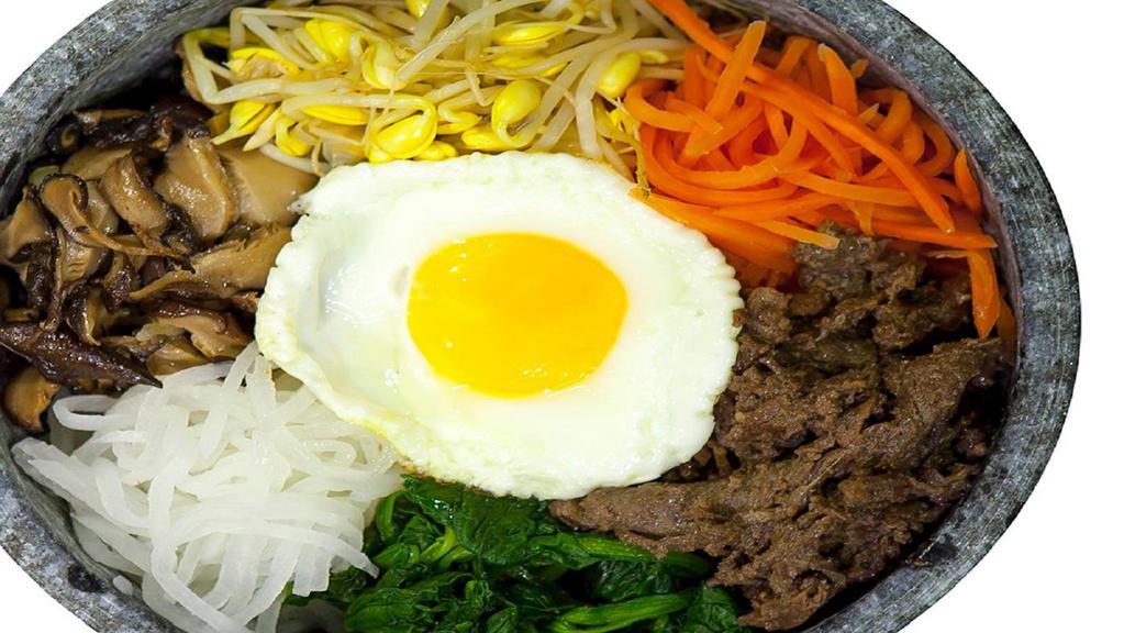 Bi Bim Bop Rice Bowl with Vegetables. · Served with Spicy Sauce on the side