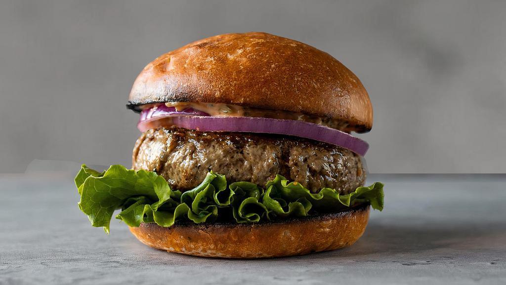 Regular Burger · carman ranch 100% grass-fed beef patty, CB sauce, lettuce, & onion on a pain de mie bun