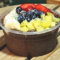 Cacao-Chia Pudding · Germinated chia infused with cacao, pineapple, bananas, strawberries, blueberries.