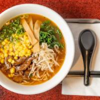 Shoyu Vegetarian Ramen · Full-bodied shoyu broth made of beans, sweet onions, garlic, and tomato. Topped with cabbage...