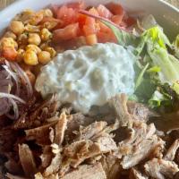 Lamb & Beef Gyro Rice Bowl · Greek gyro over rice, salad, piyaz, tzatziki sauce.