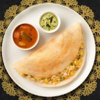 Chettinad Special Dosa · Savory crepe made of rice & lentil batter topped off with a house special Vegetable Keema sp...