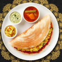 Mysore Masala Dosa · Savory crepe made of rice & lentil batter topped off with a house special Mysore spread. Ser...