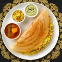Ghee Masala Dosa · Savory crepe made of rice & lentil batter and clarified butter served with seasoned potato m...