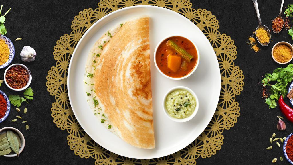 Genius Ghee Dosa  · Savory crepe made of rice & lentil batter and clarified butter served with chutneys and Sambar