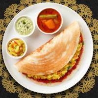 Mysore Dosa · Savory crepe made of rice & lentil batter topped off with a house special Mysore spread. Ser...