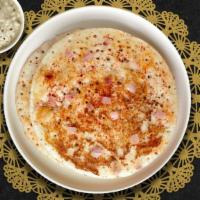 Ghee Podi Utappam · Savory pan cake made of rice & lentil batter topped off with spice powder (Podi), clarified ...