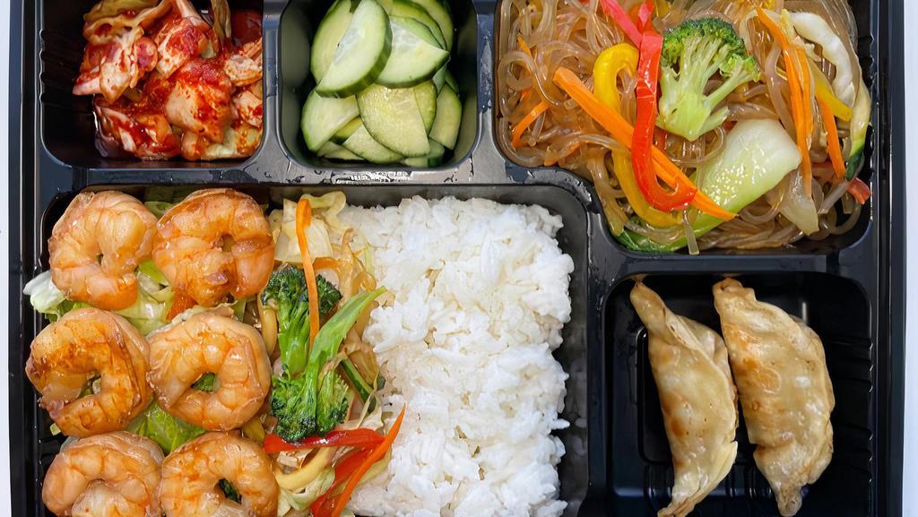 Box(Do-Si-Rack) · Your choice of main dish and rice or salad served with mandoo (two chicken pot stickers), japchae noodle (stir-fried vermicelli with vegetables), two side dishes(pickled kimchi and pickled cucumber).