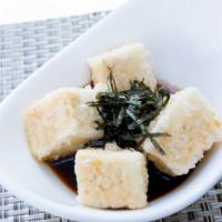 Crispy Tofu · 4 pieces. Vegetarian. Lightly fried, bean curd covered with citron soy sauce.