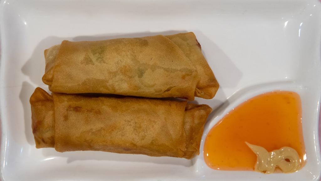 Spring Rolls · Vegetarian. Poached shrimps, lettuce, bean sprouts, mints, sweet basil and noodles wrapped and rolled in rice paper served with peanut sauce. Goi cuon.