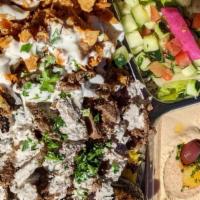 Mixed Shawarma Rice Plate · Mixed slices of beef-lamb and chicken shawarma served with roasted tomato, seasoned onions, ...