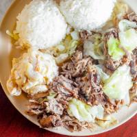 Kalua Pork With Cabbage And Lau Lau · Our kalua pork is made in-house with locally sourced pork that's cooked to a tender, falling...