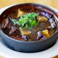 Sp12. Eggplant Tofu Clay Pot · Gluten-free. Fried organic tofu, eggplant and mushroom cooked in house special sauce.