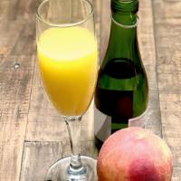 White Peach Mimosa · A champagne split and orange juice with the classic Bellini flavor of white peach. (270 Cal)