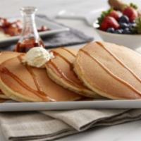 Stack Grande · Four buttermilk griddlecakes with whipped margarine and maple syrup. (860 cal).