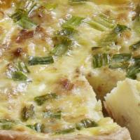 Brkfast Quiche Lorraine · Bacon, parmesan and swiss cheese. Served with Roasted Potatoes. (700 cal) .