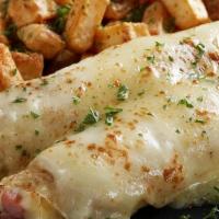 Ham & Cheese Crepes · Thick-cut ham and melted swiss cheese topped with a creamy mornay cheese sauce. Served with ...