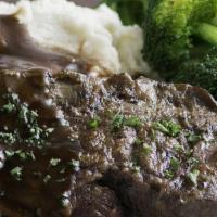 Pot Roast. · Slowly braised and simmered in red wine shallot gravy. Served with choice of two sides. (460...
