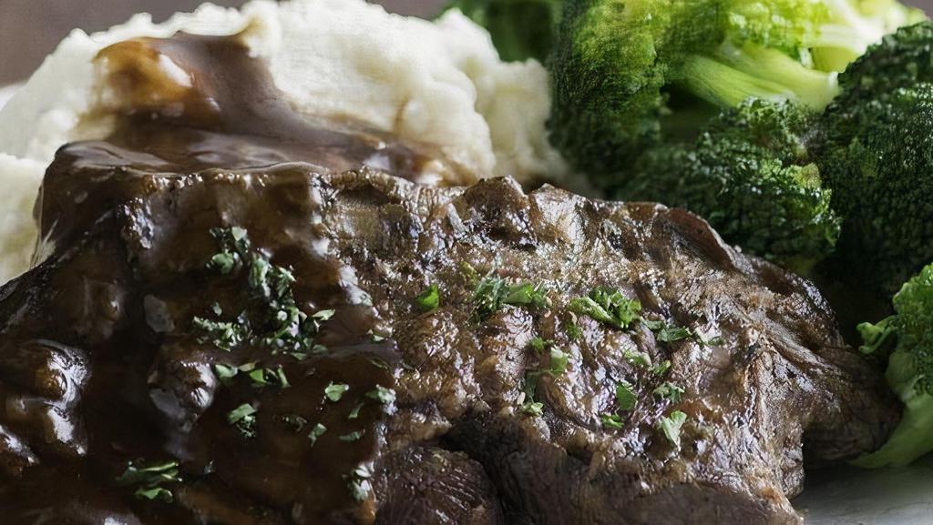 Pot Roast · Slowly braised and simmered in red wine shallot gravy. Served with choice of two sides. (460 Cal)
