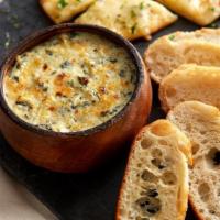 Spinach Art Dip · Rich and creamy with aged parmesan and chopped kale. Served with crostinis. (670 cal) .