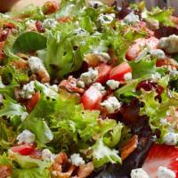 Walnut Salmon Salad · Crisp bacon, strawberries, dried cranberries, tomato, crumbled bleu cheese and mixed greens ...