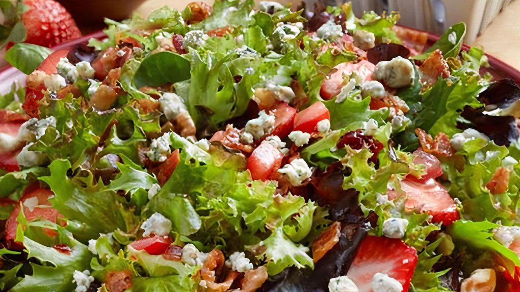 Bacon, Blu Chs & Walnut Chicken Salad · Crisp bacon, strawberries, dried cranberries, tomato, crumbled bleu cheese and mixed greens with balsamic dressing. (660 Cal)