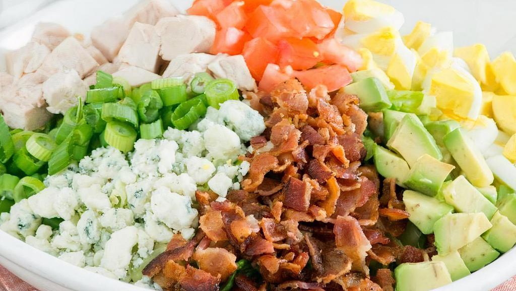 Cobb Salade · Slow-roasted turkey, bacon, chopped egg, avocado, tomatoes, green onions and crumbled bleu cheese on lettuce with the dressing of your choice. (400-570 cal).
