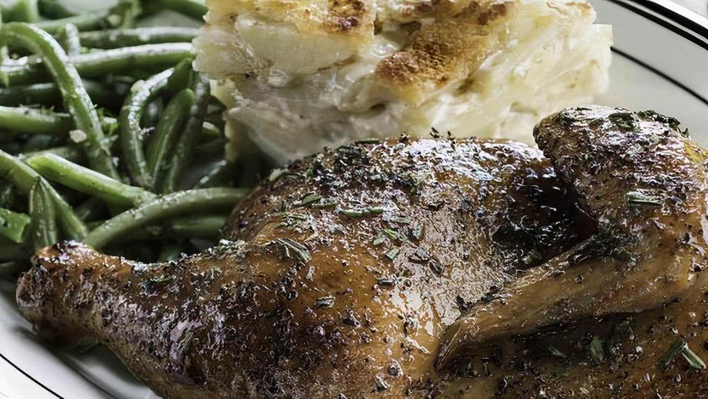 Roasted Half Chicken · Slow-roasted with housemade herb butter. Served with choice of two sides. (600 Cal)