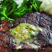 Ribeye Steak · 28-day aged, 10 oz. USDA choice ribeye steak. House-made herbes de Provence butter available...