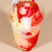 Angelitos · Shaved ice with fresh diced strawberries, bananas, vanilla syrup, and condensed milk.