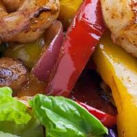 Shrimp Fajita Salad · Lettuce, chips strips, avocado slices, salsa ranchera and dressing on the side. italian or r...