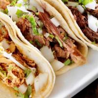 Taco (Regular) · Choice of meat, onions, cilantro and salsa on the side.