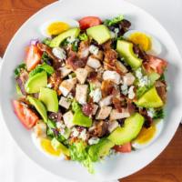 COBB SALAD · Mixed greens, diced chicken breast, bacon, blue cheese crumbles, , tomato, and hard-boiled e...