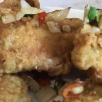 Salt & Pepper Chicken · Hot & spicy. Deep fried chicken chunks with jalapeño and onion.