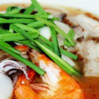 Bun Mam · Fermented fish Noodle soup with shrimp, squid, roast pork and swai fish.