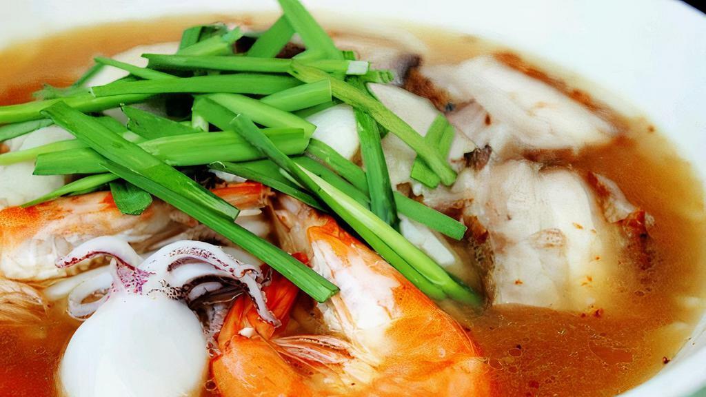 Bun Mam · Fermented fish Noodle soup with shrimp, squid, roast pork and swai fish.