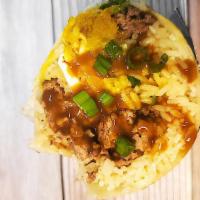 Loco Moco Breakfast Burrito · Ground sirloin, grilled mushrooms, eggs over easy, Hawaiian-style gravy, sliced green onions...