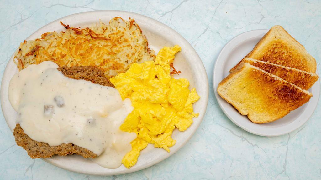 Chicken Fried Steak, Gravy, Eggs & Potatoes · Everyone's favorite comfort' classic.